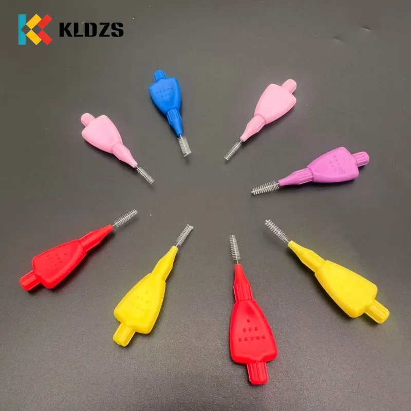 Sikat Interdental sing bentuke pesawat
