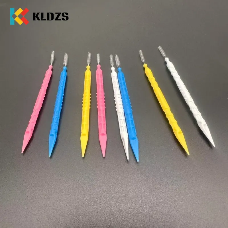 Sikat Interdental sing bentuke balung iwak